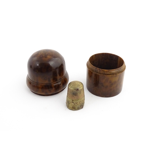 1166 - A small treen style container with banded detail. Together with a small brass thimble. Pot approx. 2... 