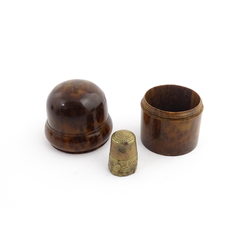 1166 - A small treen style container with banded detail. Together with a small brass thimble. Pot approx. 2... 