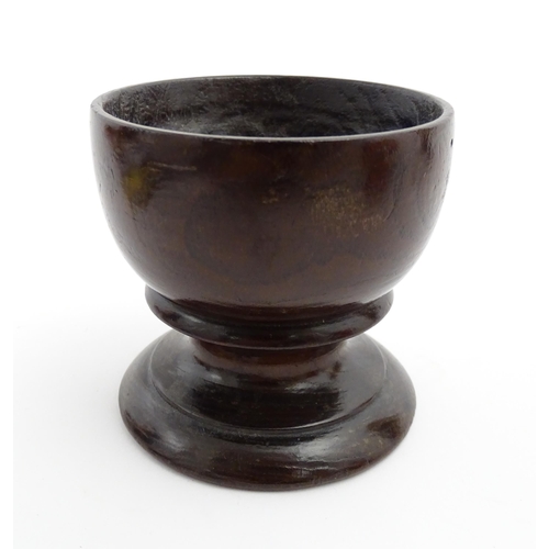 1168 - Treen : A 19thC laburnum salt of pedestal form. Approx. 3