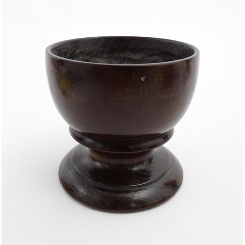 1168 - Treen : A 19thC laburnum salt of pedestal form. Approx. 3