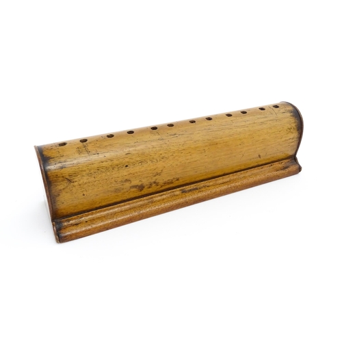 1201 - Two turned wooden stands, each with holes to top. Possibly for incense sticks. Largest approx. 19 1/... 