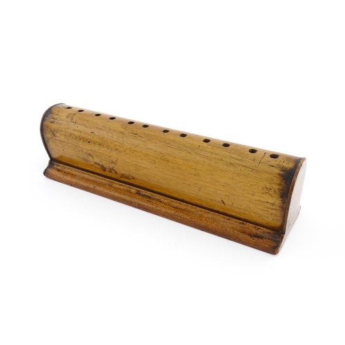 1201 - Two turned wooden stands, each with holes to top. Possibly for incense sticks. Largest approx. 19 1/... 