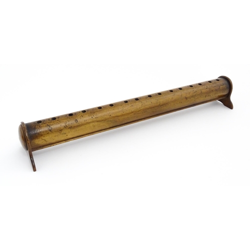 1201 - Two turned wooden stands, each with holes to top. Possibly for incense sticks. Largest approx. 19 1/... 