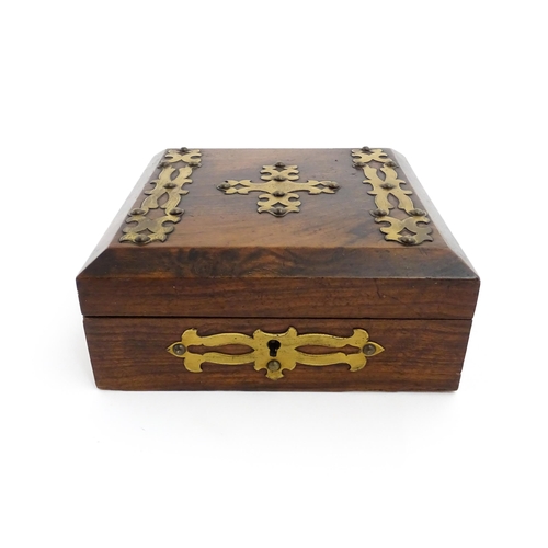 1206 - A 19thC walnut box of square form with applied gilt metal mounts. The interior of the lid bearing th... 