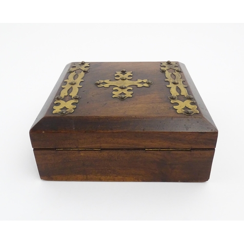 1206 - A 19thC walnut box of square form with applied gilt metal mounts. The interior of the lid bearing th... 