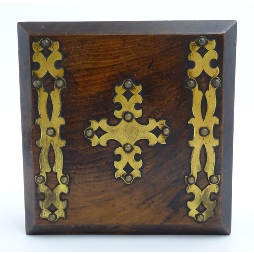 1206 - A 19thC walnut box of square form with applied gilt metal mounts. The interior of the lid bearing th... 