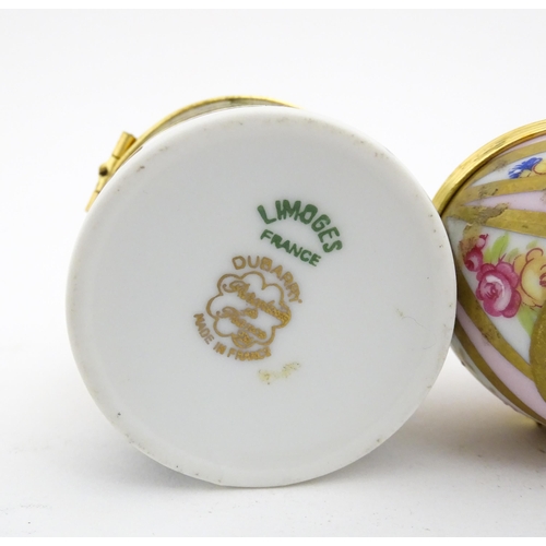 1210 - Two 20thC Limoges Dubarry porcelain boxes, one modelled as an egg with floral detail, the other of c... 