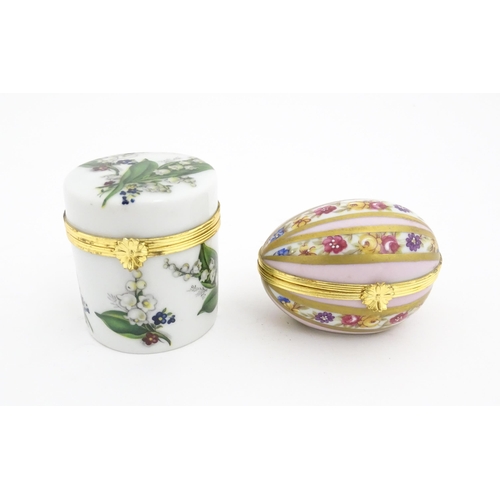 1210 - Two 20thC Limoges Dubarry porcelain boxes, one modelled as an egg with floral detail, the other of c... 