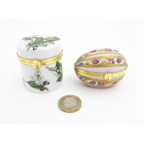 1210 - Two 20thC Limoges Dubarry porcelain boxes, one modelled as an egg with floral detail, the other of c... 