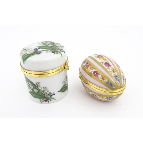 1210 - Two 20thC Limoges Dubarry porcelain boxes, one modelled as an egg with floral detail, the other of c... 