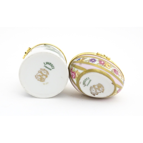 1210 - Two 20thC Limoges Dubarry porcelain boxes, one modelled as an egg with floral detail, the other of c... 