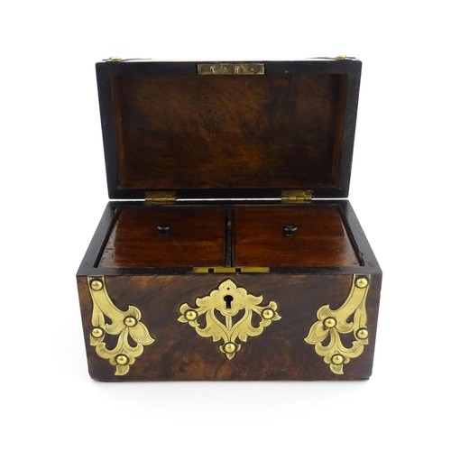 1211 - A 19thC walnut tea caddy of dome form with brass strapwork decoration and rivet detail, opening to r... 