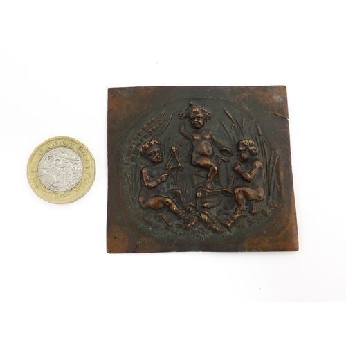 1213 - A small 19thC bronze plaque / mount depicting three putti / cherubs playing musical instruments amon... 