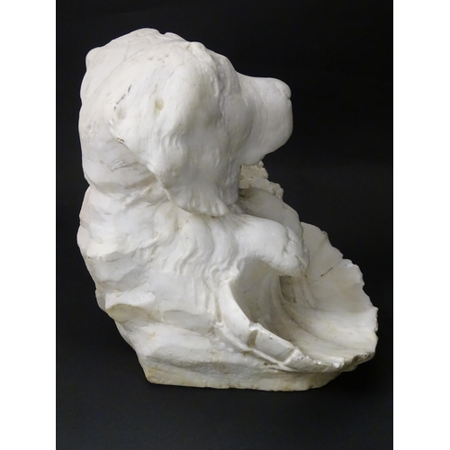 1229 - A 19thC carved alabaster sculpture depicting a dog and a young child. Indistinctly signed to reverse... 