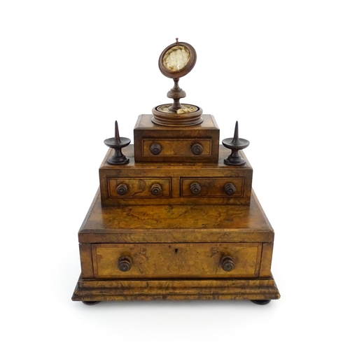 1244 - A 19thC burr walnut tiered sewing box / casket, of stepped form, comprising three sections containin... 