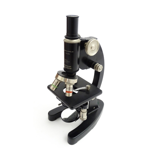 1247 - A mid 20thC laboratory microscope by Cooke, Troughton & Simms Ltd, York, fitted with rotary lenses o... 