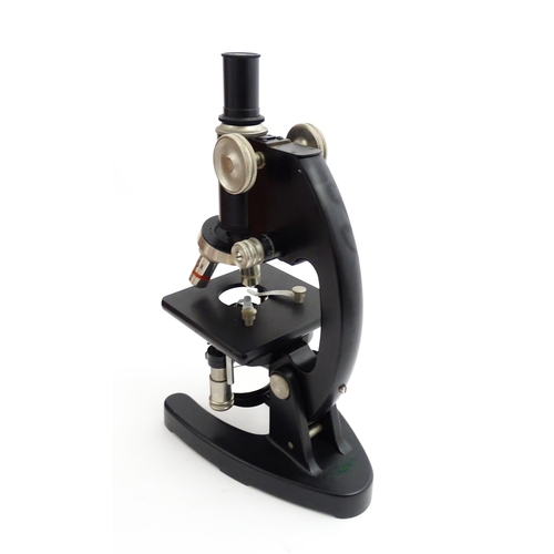 1247 - A mid 20thC laboratory microscope by Cooke, Troughton & Simms Ltd, York, fitted with rotary lenses o... 