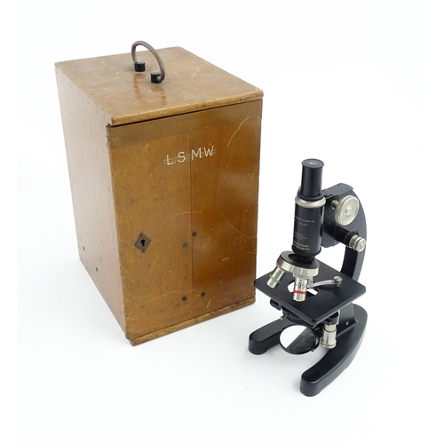 1247 - A mid 20thC laboratory microscope by Cooke, Troughton & Simms Ltd, York, fitted with rotary lenses o... 