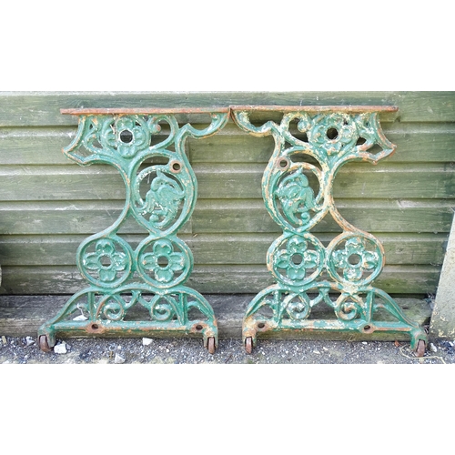 1340 - Garden / Architectural : A pair of late 19th / early 20thC cast iron table uprights / supports with ... 