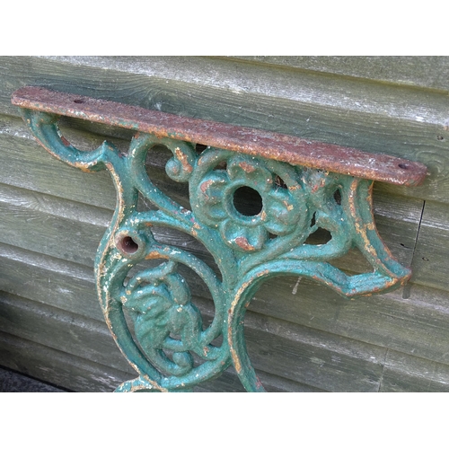 1340 - Garden / Architectural : A pair of late 19th / early 20thC cast iron table uprights / supports with ... 