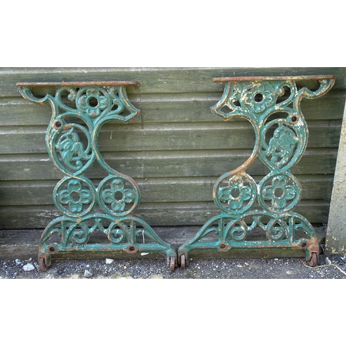 1340 - Garden / Architectural : A pair of late 19th / early 20thC cast iron table uprights / supports with ... 