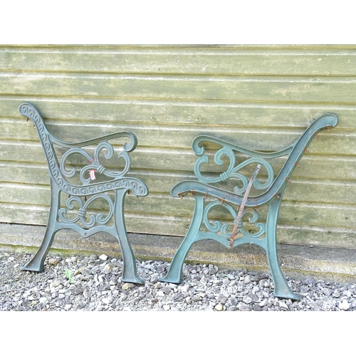 1345 - Garden / Architectural : Four cast iron bench frame ends, with scroll decoration and green painted f... 