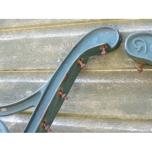 1345 - Garden / Architectural : Four cast iron bench frame ends, with scroll decoration and green painted f... 