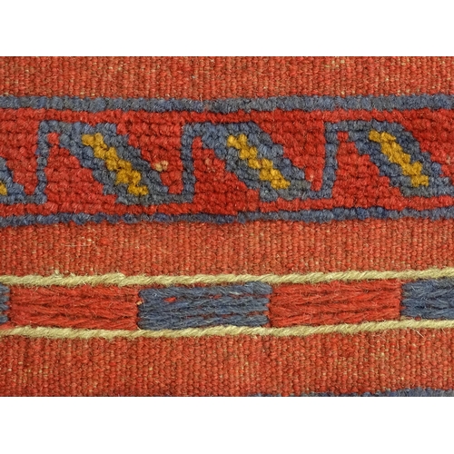 1352 - Carpet / Rug : A Meshwani runner  with red and blue ground having geometric detail. Approx.   105