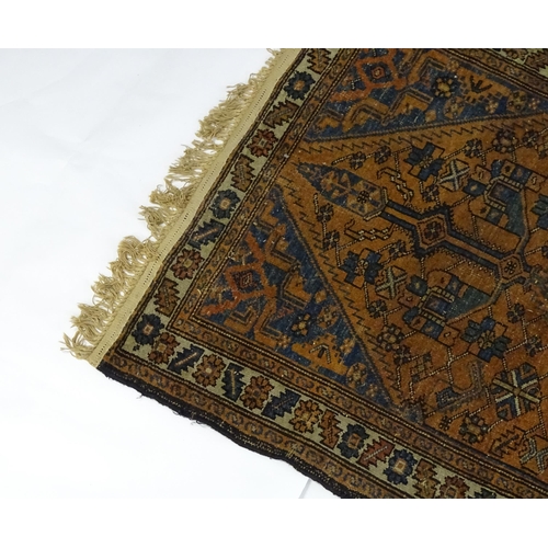 1359 - Carpet / Rug : A Belouch rug, the dark blue and red ground decorated with diamond and pole detail an... 