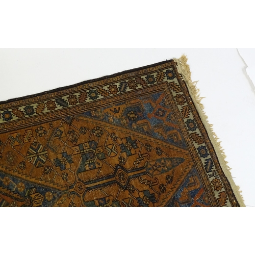 1359 - Carpet / Rug : A Belouch rug, the dark blue and red ground decorated with diamond and pole detail an... 