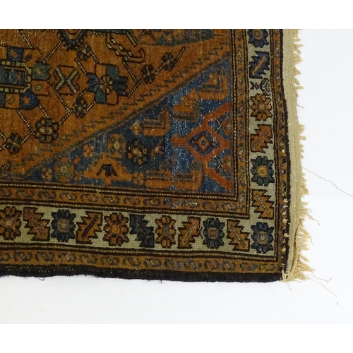 1359 - Carpet / Rug : A Belouch rug, the dark blue and red ground decorated with diamond and pole detail an... 