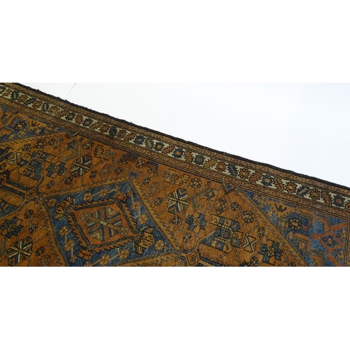 1359 - Carpet / Rug : A Belouch rug, the dark blue and red ground decorated with diamond and pole detail an... 