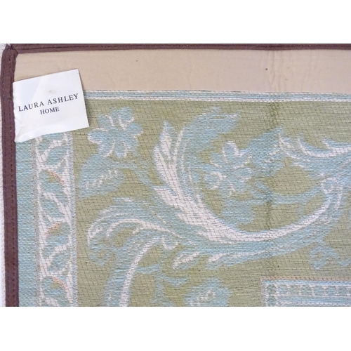 1360 - Carpet / Rug : A Laura Ashley rug, the cream ground with pale blue and beige floral and acanthus det... 