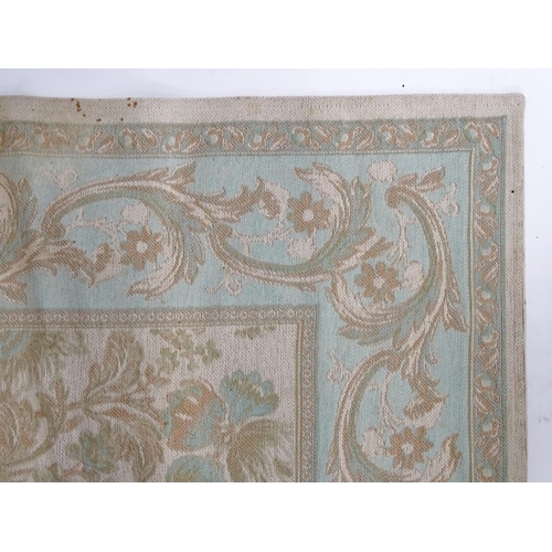 1360 - Carpet / Rug : A Laura Ashley rug, the cream ground with pale blue and beige floral and acanthus det... 