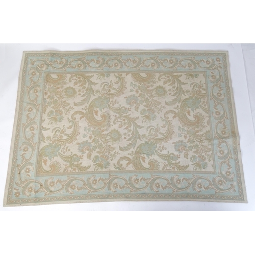 1360 - Carpet / Rug : A Laura Ashley rug, the cream ground with pale blue and beige floral and acanthus det... 