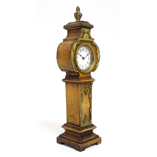 1400 - A Swiss miniature longcase clock with Arabic numerals Approx 11 1/2