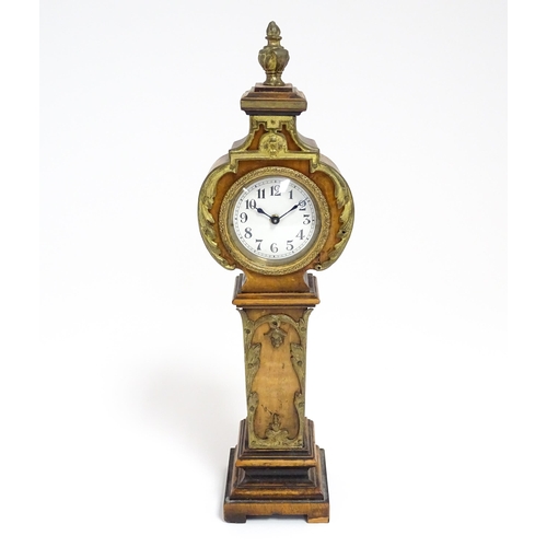 1400 - A Swiss miniature longcase clock with Arabic numerals Approx 11 1/2