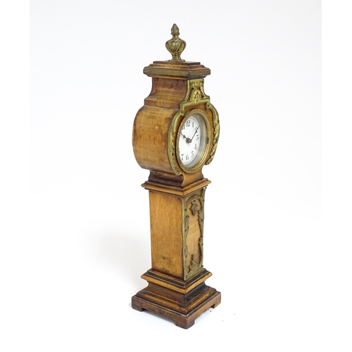 1400 - A Swiss miniature longcase clock with Arabic numerals Approx 11 1/2