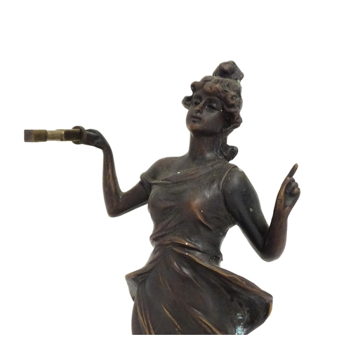 1409 - A Junghans Mystery ( swinging) clock  formed as a spelter lady approx 11 1/2