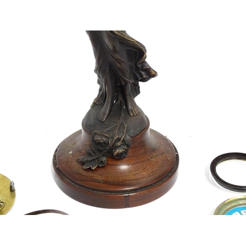 1409 - A Junghans Mystery ( swinging) clock  formed as a spelter lady approx 11 1/2