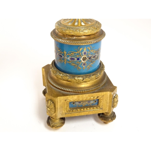 1412 - A 19thC French Japy Freres gilt metal and enamelled clock garniture, the blue penal decorated with g... 