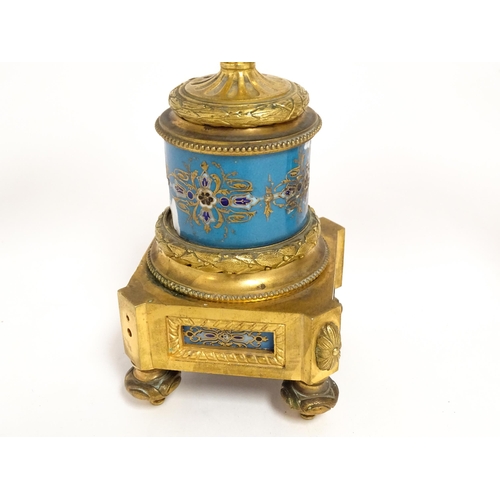 1412 - A 19thC French Japy Freres gilt metal and enamelled clock garniture, the blue penal decorated with g... 