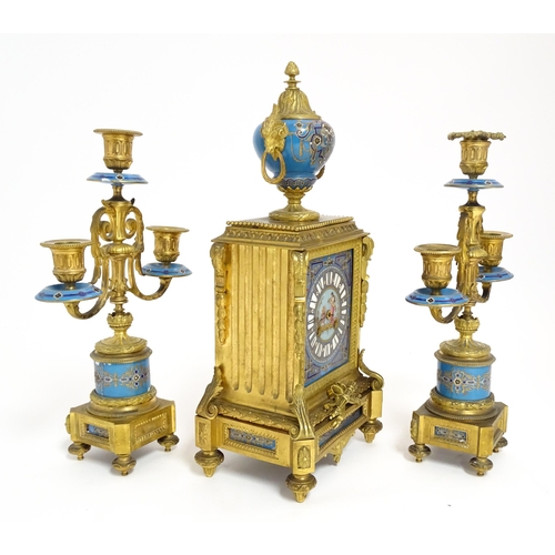 1412 - A 19thC French Japy Freres gilt metal and enamelled clock garniture, the blue penal decorated with g... 