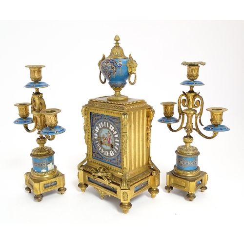 1412 - A 19thC French Japy Freres gilt metal and enamelled clock garniture, the blue penal decorated with g... 