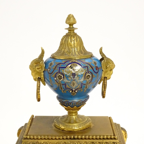 1412 - A 19thC French Japy Freres gilt metal and enamelled clock garniture, the blue penal decorated with g... 