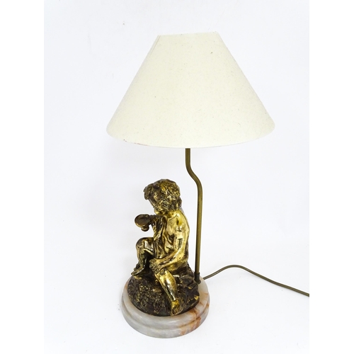 1419 - A 20thC table lamp decorated with a Bacchanalian figure mounted on an alabaster base. Approx. 21