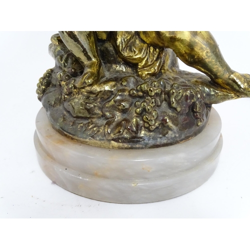 1419 - A 20thC table lamp decorated with a Bacchanalian figure mounted on an alabaster base. Approx. 21