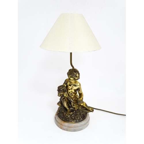 1419 - A 20thC table lamp decorated with a Bacchanalian figure mounted on an alabaster base. Approx. 21