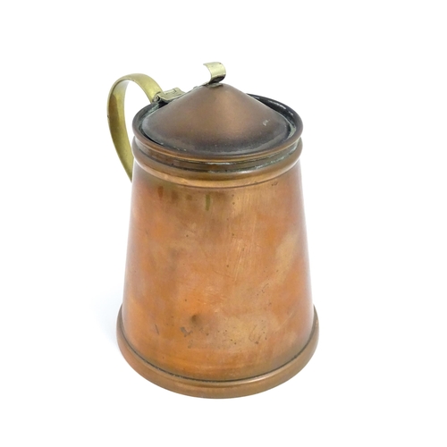 1000 - WAS Benson: An Arts & Crafts copper and brass insulated hot water jug. Marked under W. A. S. Benson.... 