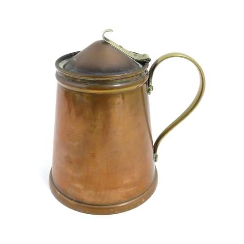 1000 - WAS Benson: An Arts & Crafts copper and brass insulated hot water jug. Marked under W. A. S. Benson.... 